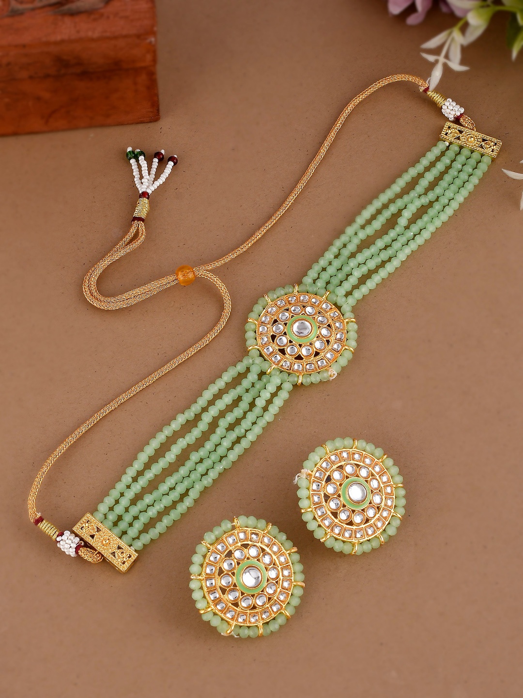 

Shoshaa Gold-Plated Sea Green & White Onyx Studded & Beaded Jewellery Set