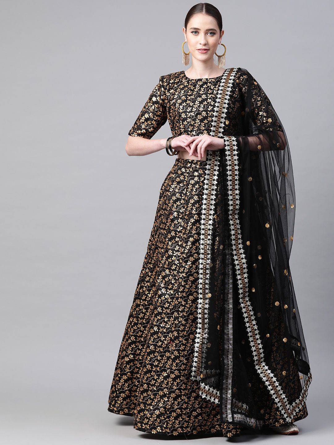 

Readiprint Fashions Black & Gold-Toned Embellished Sequinned Semi-Stitched Lehenga & Unstitched Blouse With