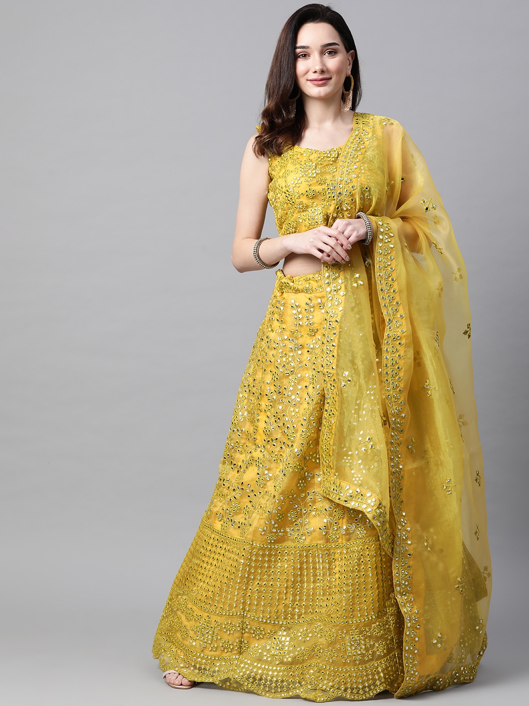 

Readiprint Fashions Yellow Embroidered Mirror Work Semi-Stitched Lehenga & Unstitched Blouse With Dupatta