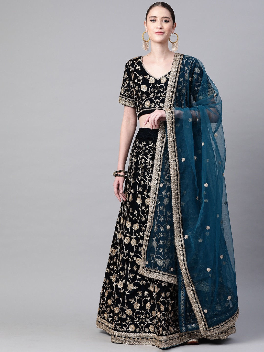 

Readiprint Fashions Teal & Gold-Toned Embroidered Thread Work Semi-Stitched Lehenga & Unstitched Blouse With