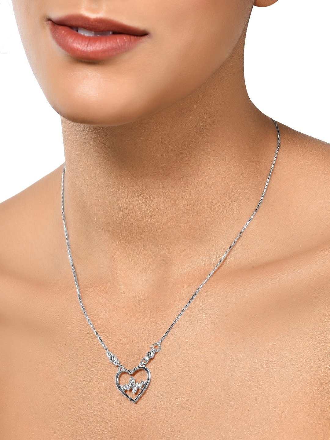 

AMI Silver-Plated Brass Cubic Zirconia Heartbeat Inside Heart Frame Necklace