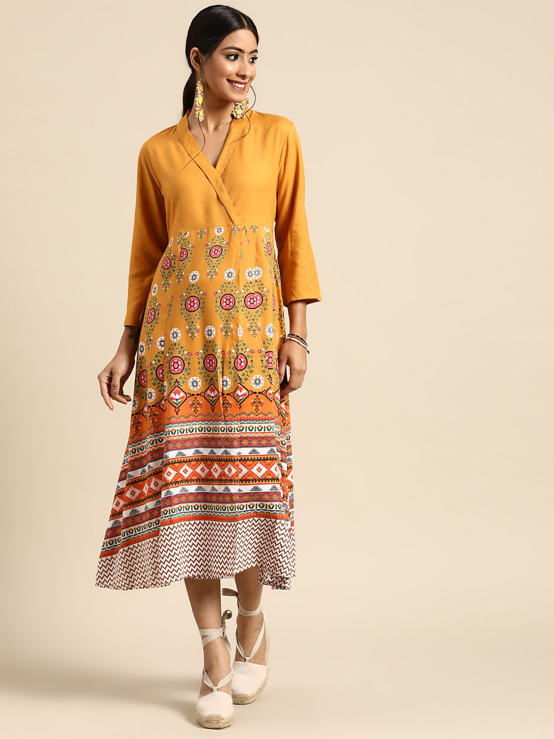 

Sangria Women Mustard Yellow Printed Wrap Ethnic Dress