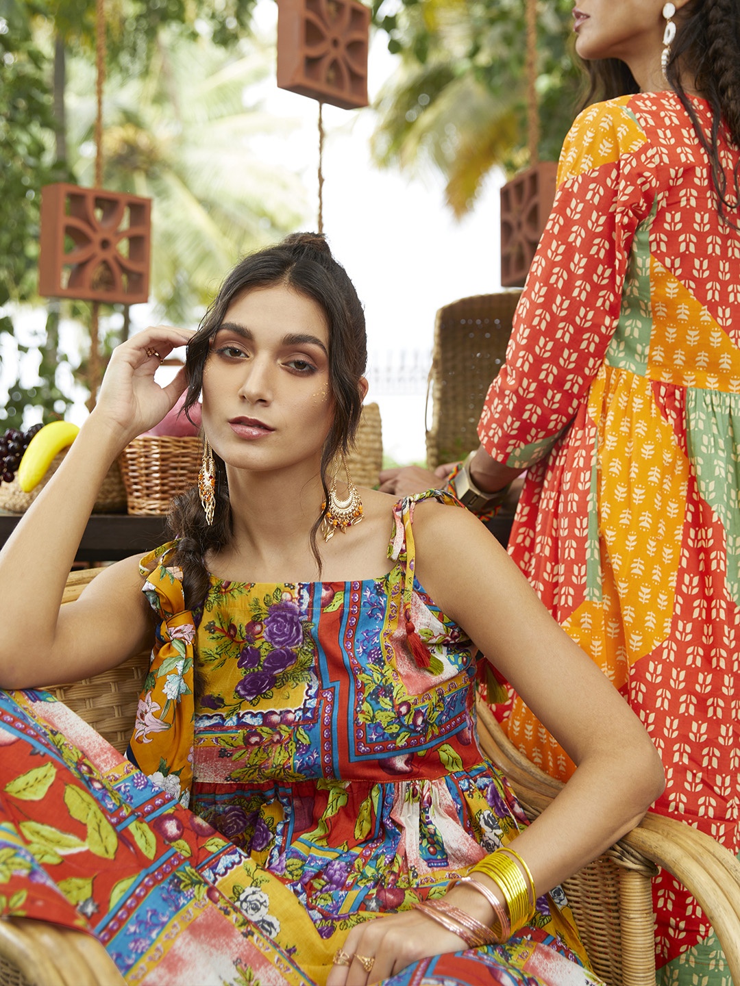 

Sangria Orange & Yellow Ethnic Motifs Tie-Up Neck Ethnic A-Line Midi Dress