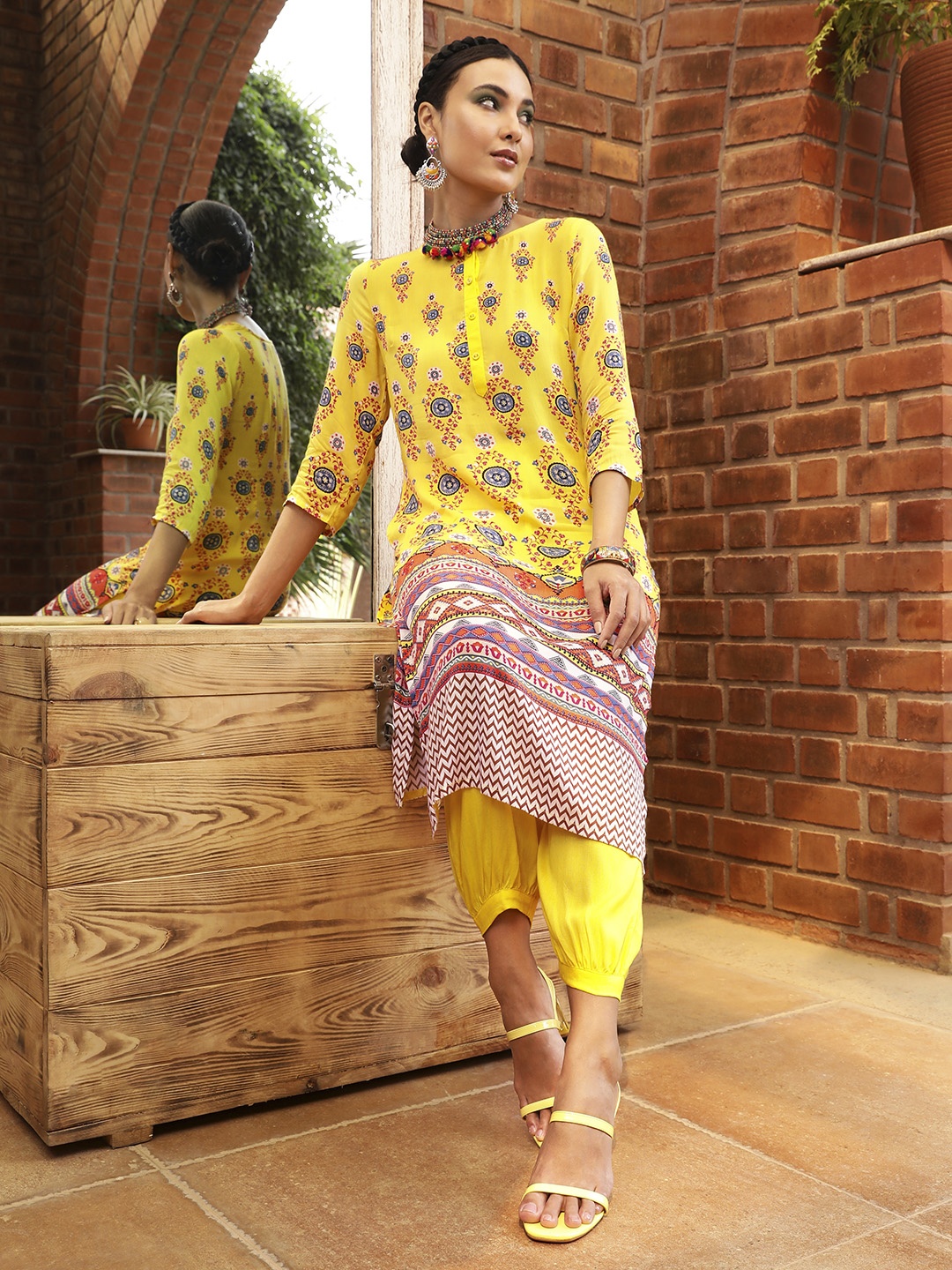 

Sangria Women Yellow Ethnic Motifs Printed Kurta with Salwar