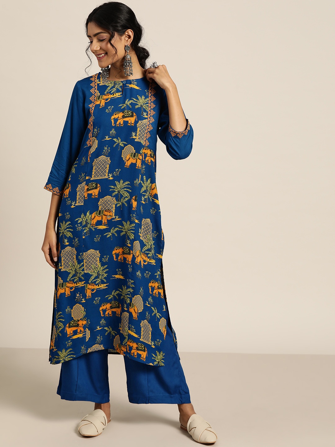 

Sangria Women Blue & Mustard Yellow Ethnic Motifs Printed Kurta with Palazzos
