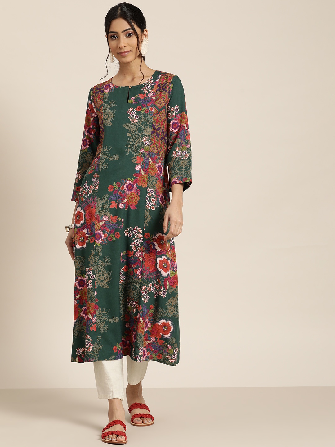 

Sangria Women Green & Orange Floral Printed Keyhole Neck Floral Kurta