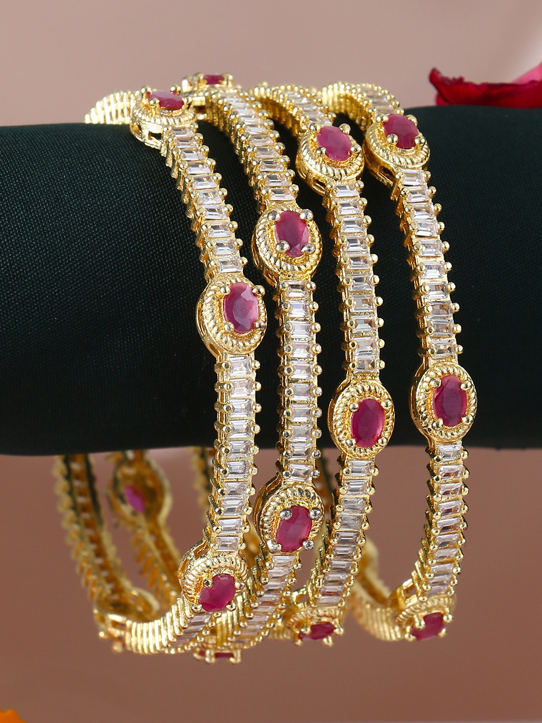 

Adwitiya Collection Woman Set Of 4 Gold-Plated White Stone-Studded Bangles