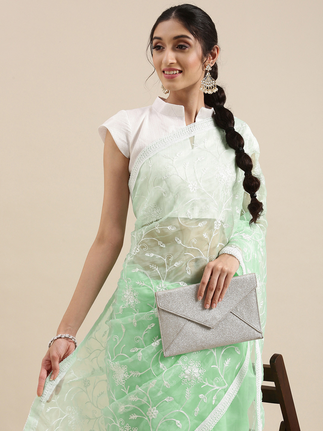 

Mitera Turquoise Blue Floral Embroidered Organza Saree