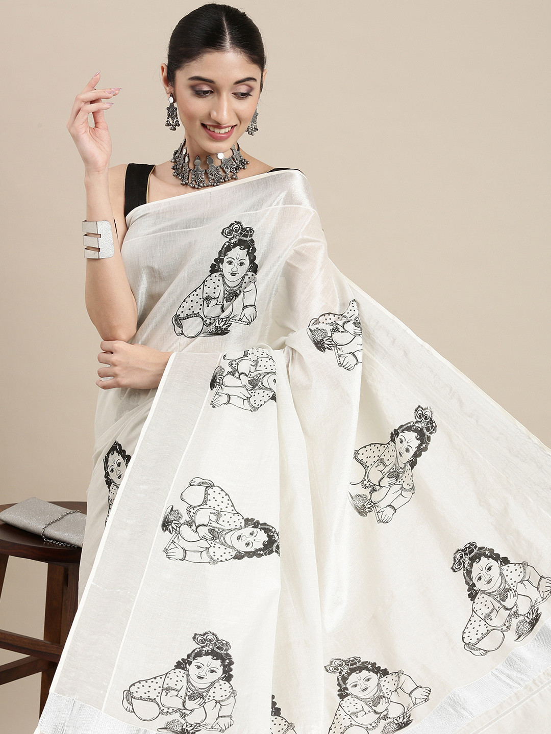 

Thara Sarees Women Off White & Black Ethnic Motifs Zari Pure Cotton Kasavu Saree