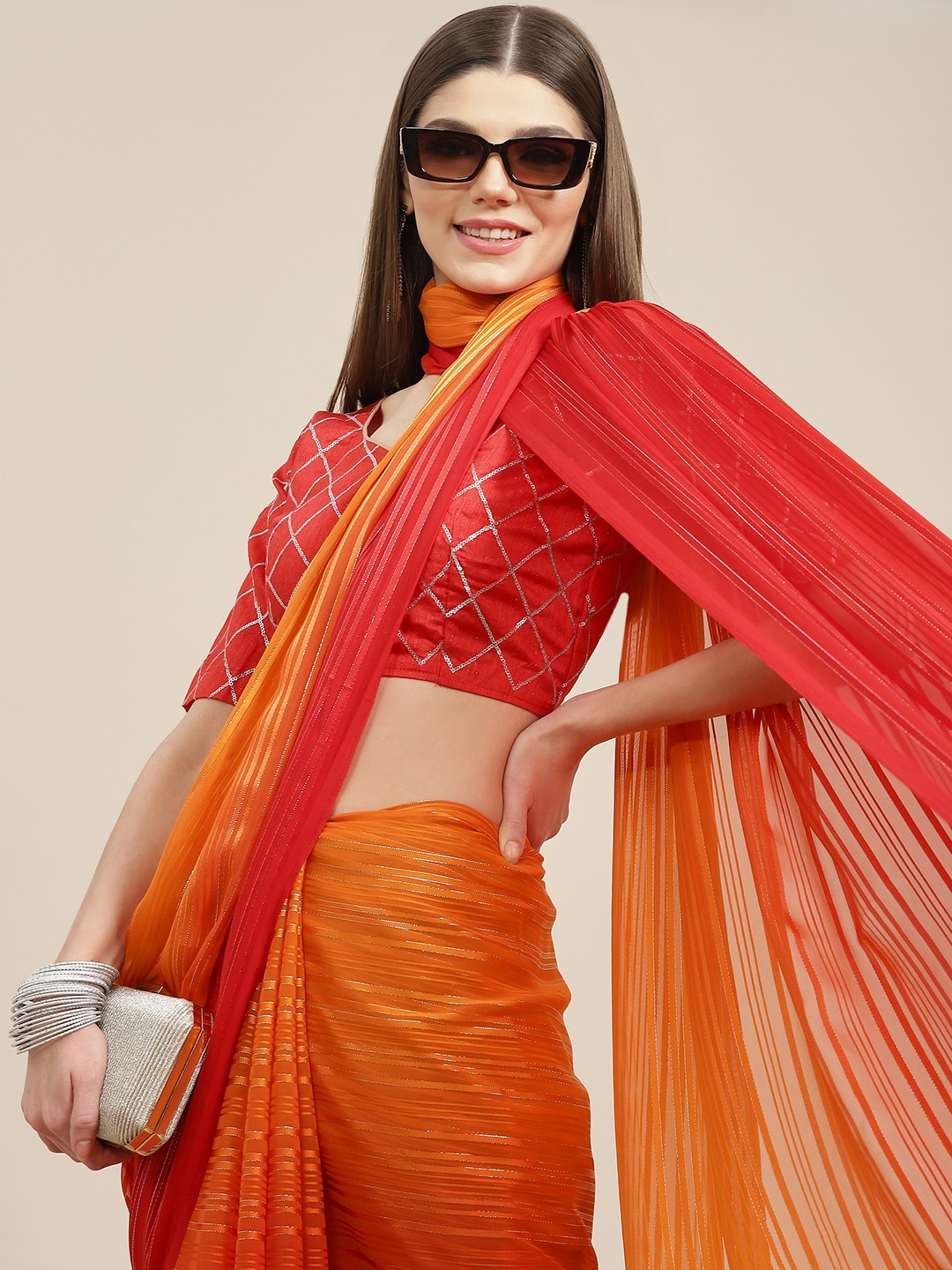 

Mitera Red & Orange Striped Saree