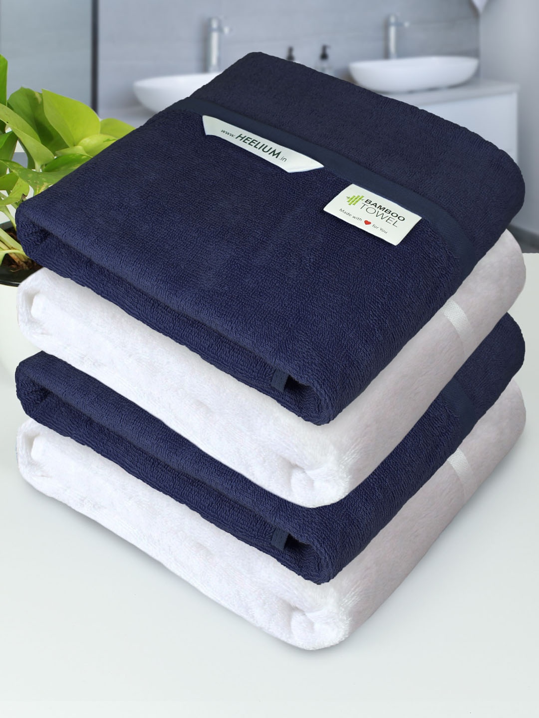 

Heelium Pack Of 4 Navy Blue & White Solid 400 GSM Cotton Bath Towels