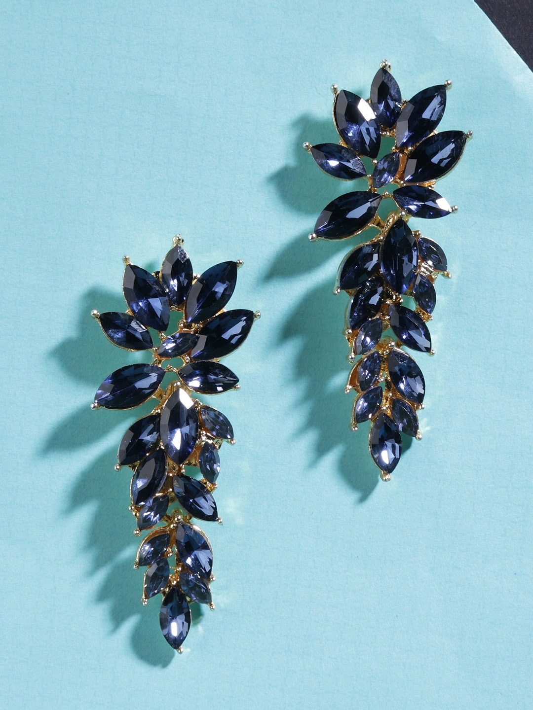 

Yellow Chimes Navy Blue Leaf Shaped Drop Earrings