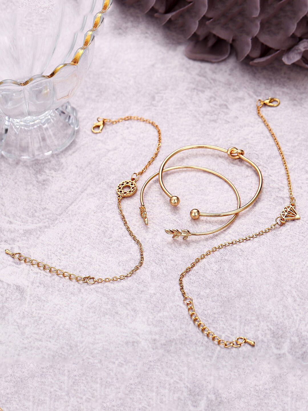 

Yellow Chimes Women Set Of 4 Gold-Plated Cuff Bracelet