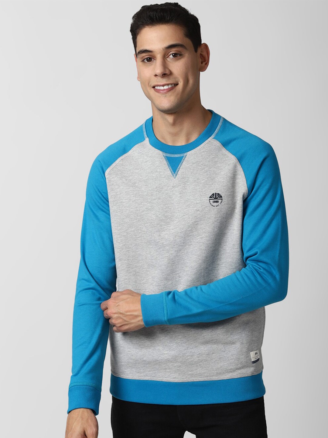 

Peter England Casuals Men Grey Colourblocked Sweatshirt