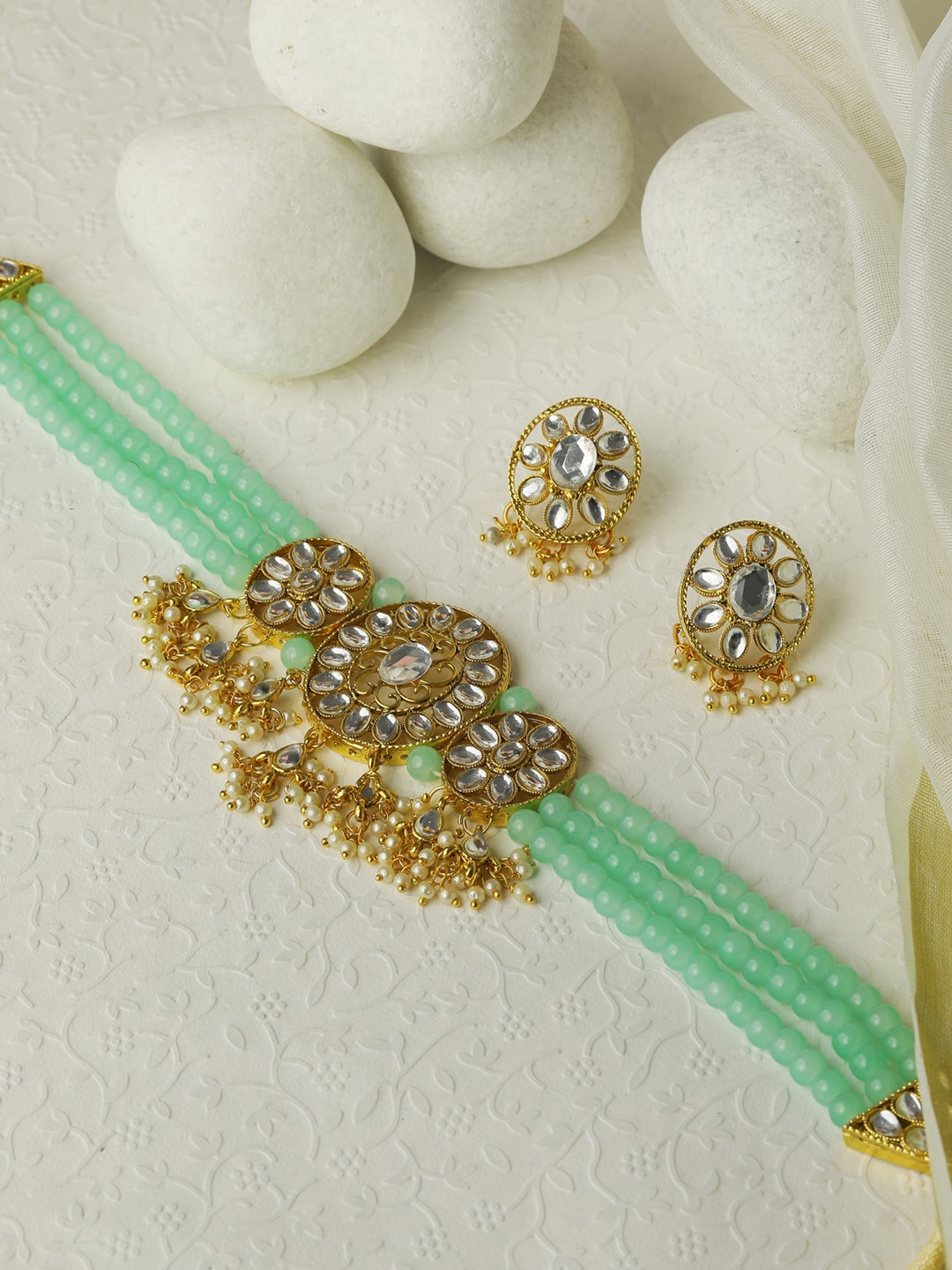 

Priyaasi Gold-Plated Green & White Stone-Studded & Pearl Beaded Choker Jewellery Set