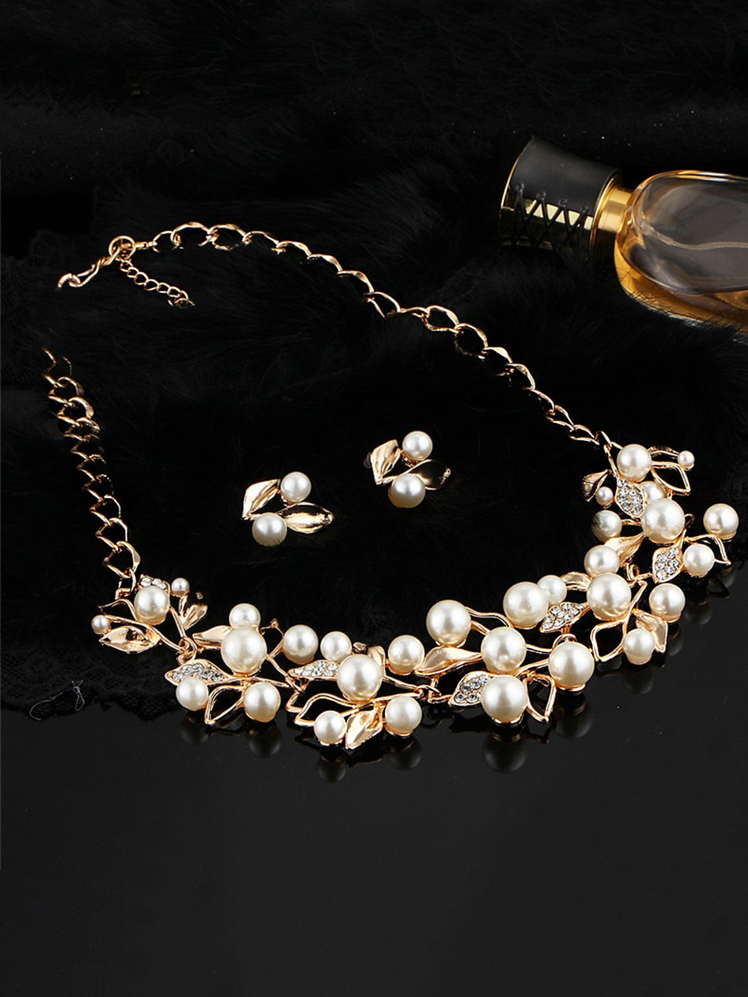 

Yellow Chimes Gold-Plated White & Off White CZ & Pearl-Studded Jewellery Set