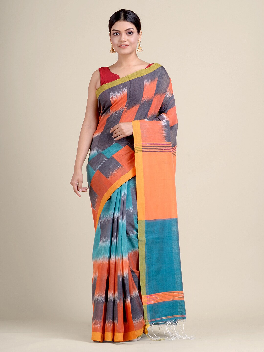 

Charukriti Blue & Orange Woven Design Saree