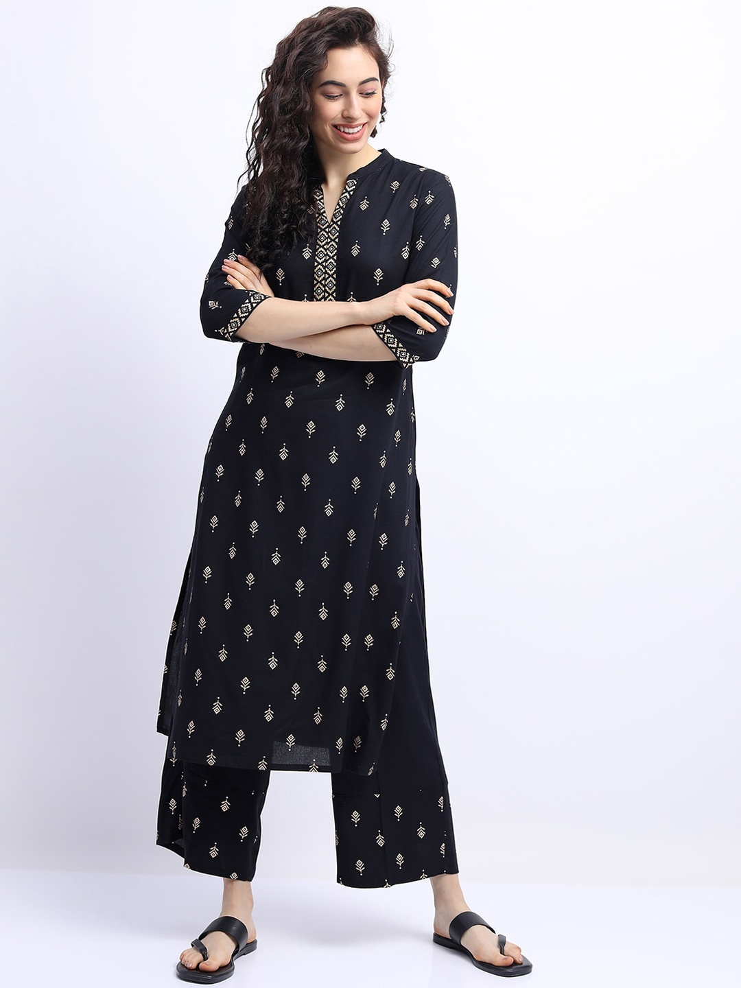 

Vishudh Women Black Printed Panelled Kurta with Palazzo