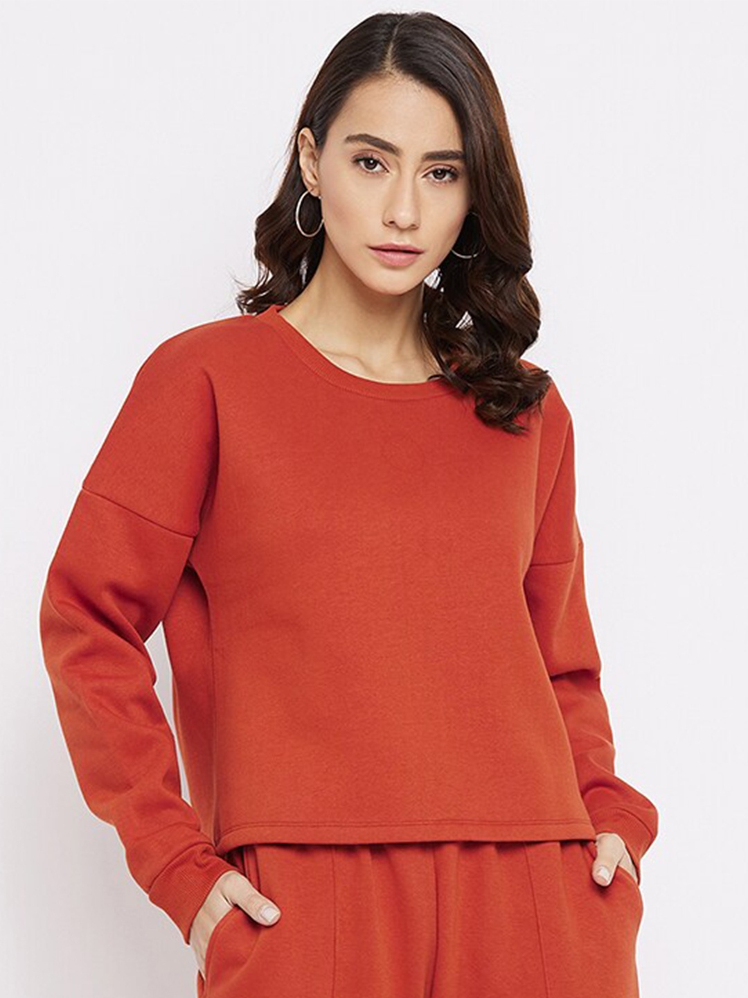 

Nun Women Rust Solid Round Neck Sweatshirt