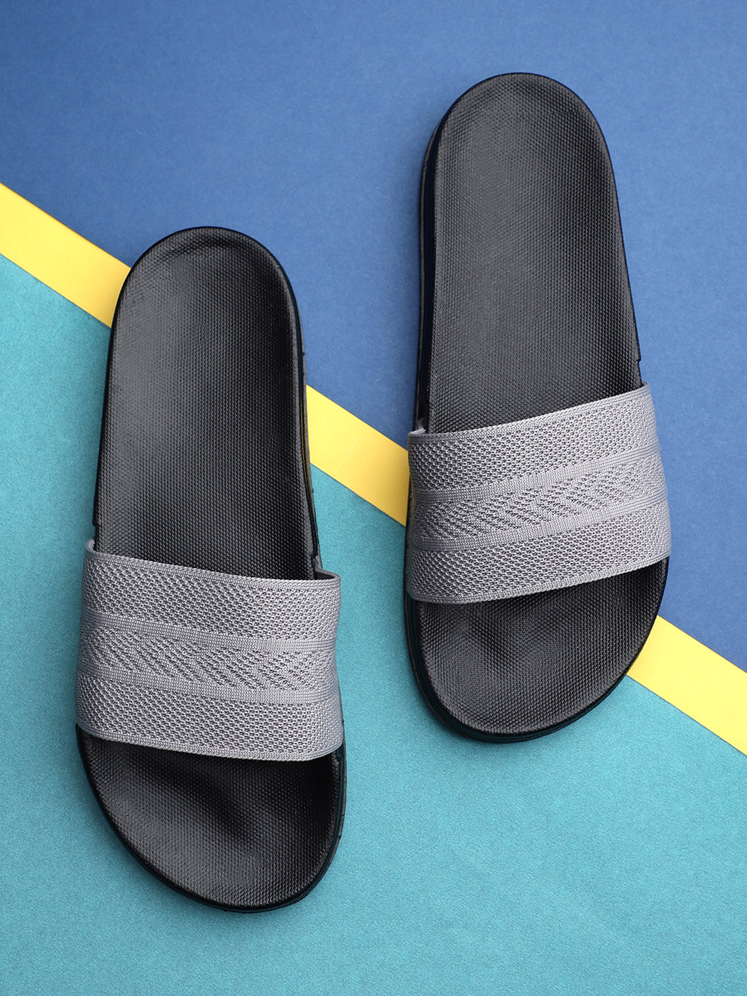 

Pampy Angel Men Grey & Black Printed Rubber Sliders