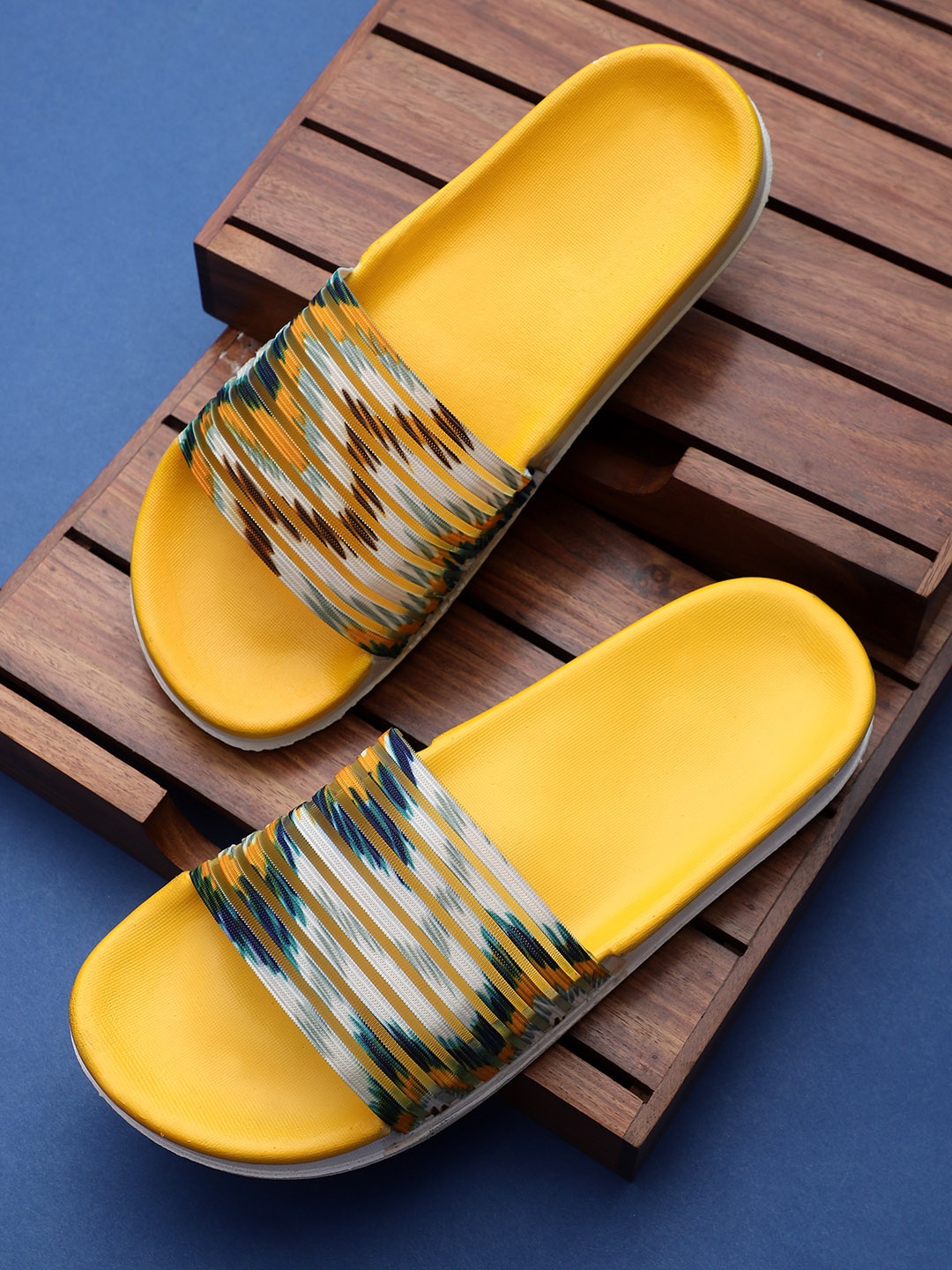 

Pampy Angel Women Yellow & White Printed Rubber Slider Flip Flops