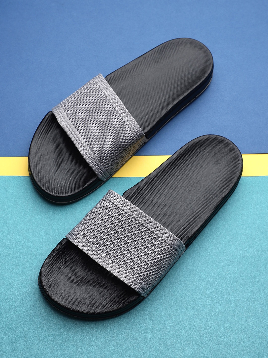 

Pampy Angel Men Grey Self Design Sliders