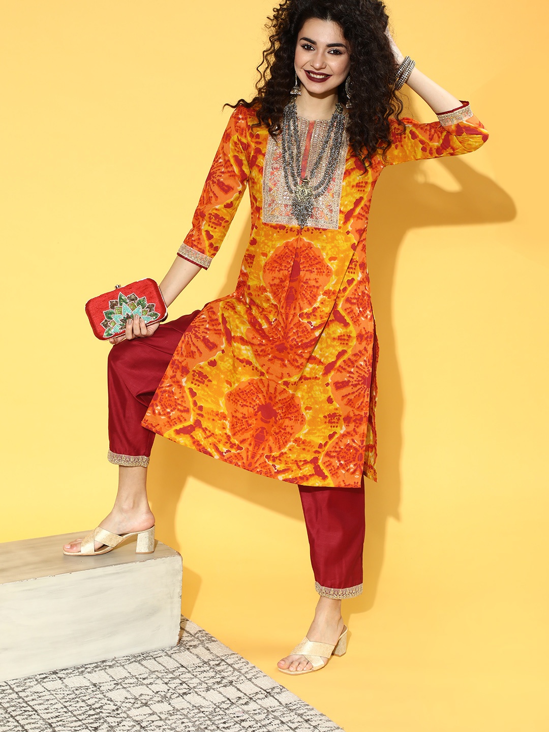 

Indo Era Women Yellow Tie & Dye Sequinned Yoke Design Kurta with Trousers