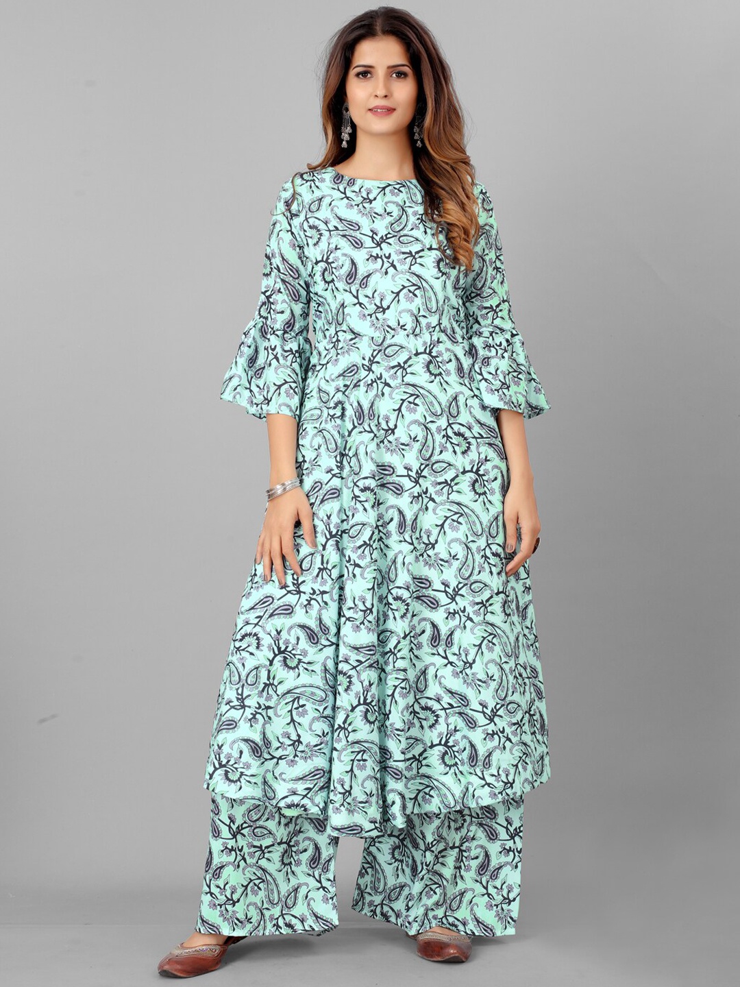 

SHOPGARB Women Turquoise Blue Floral Printed Empire Kurta with Palazzo