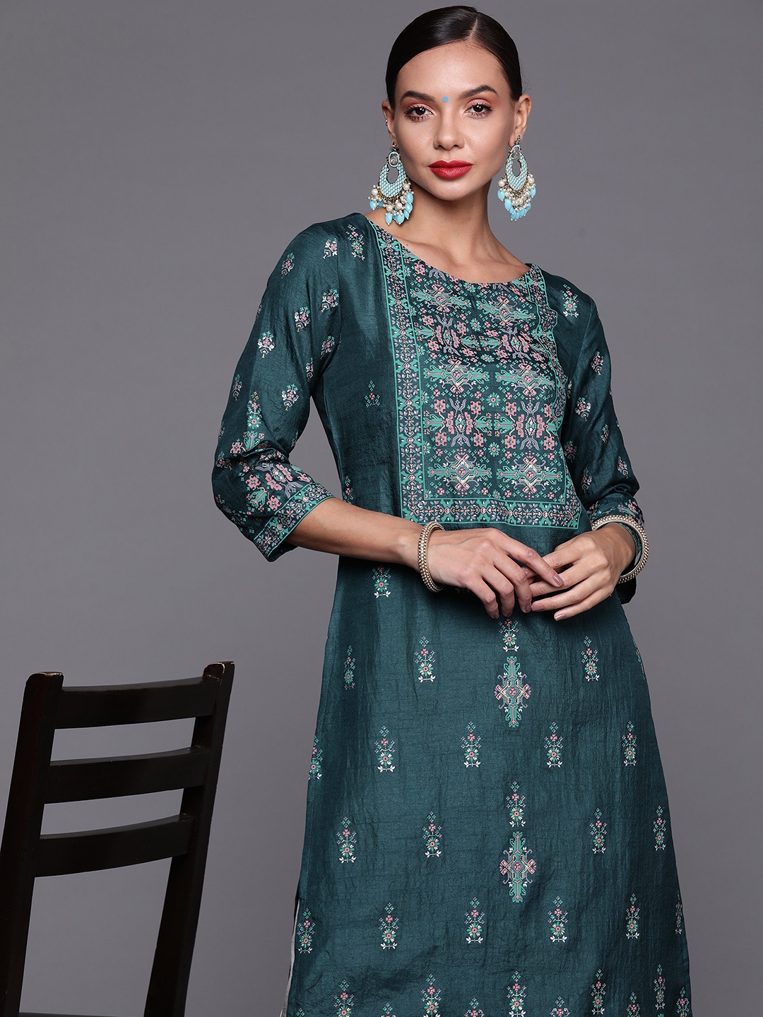 

Indo Era Women Teal Blue & White Ethnic Motifs Printed Kurta with Palazzos