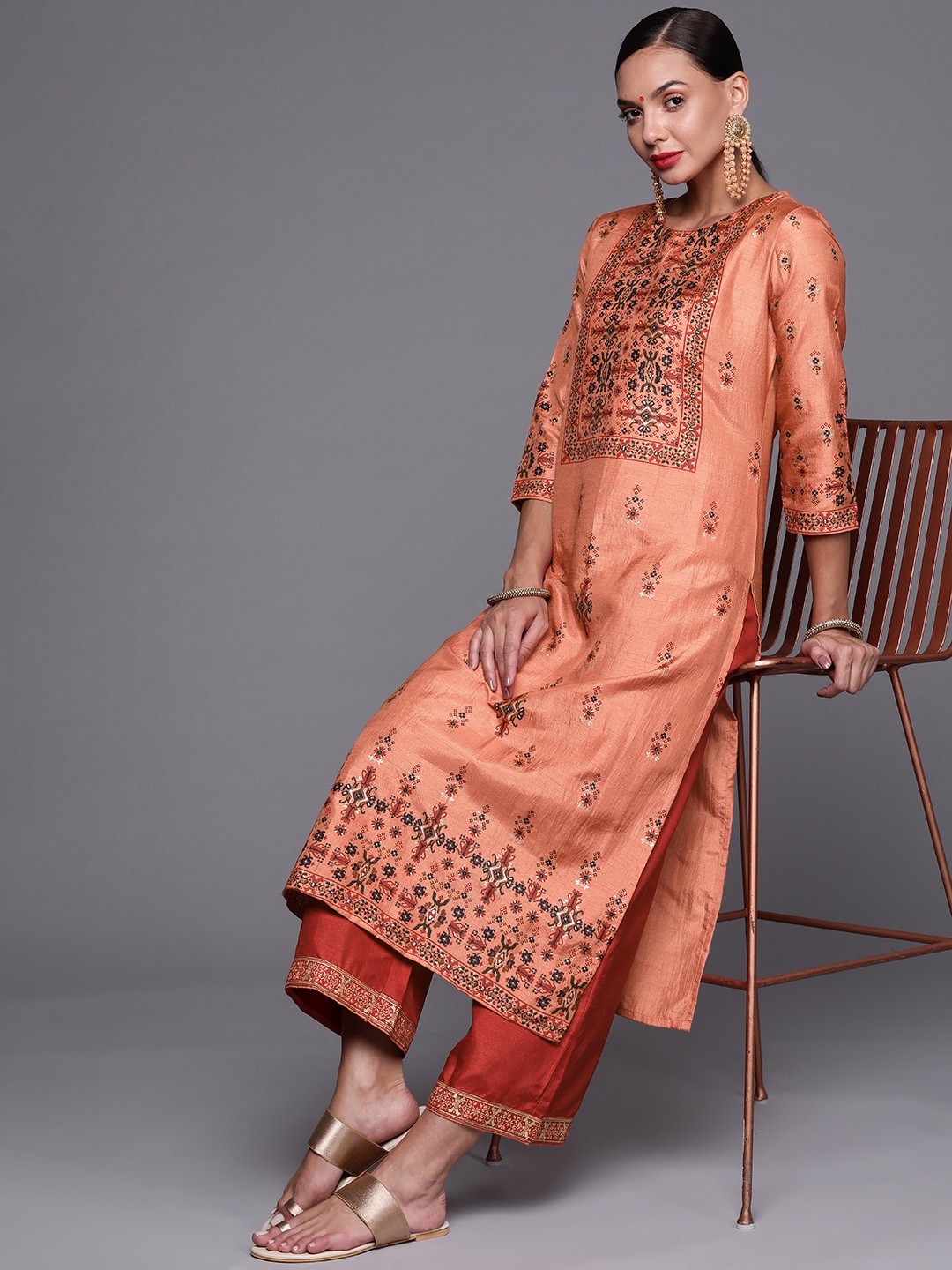 

Indo Era Women Rust Red & Orange Ethnic Motifs Printed Kurta with Palazzos