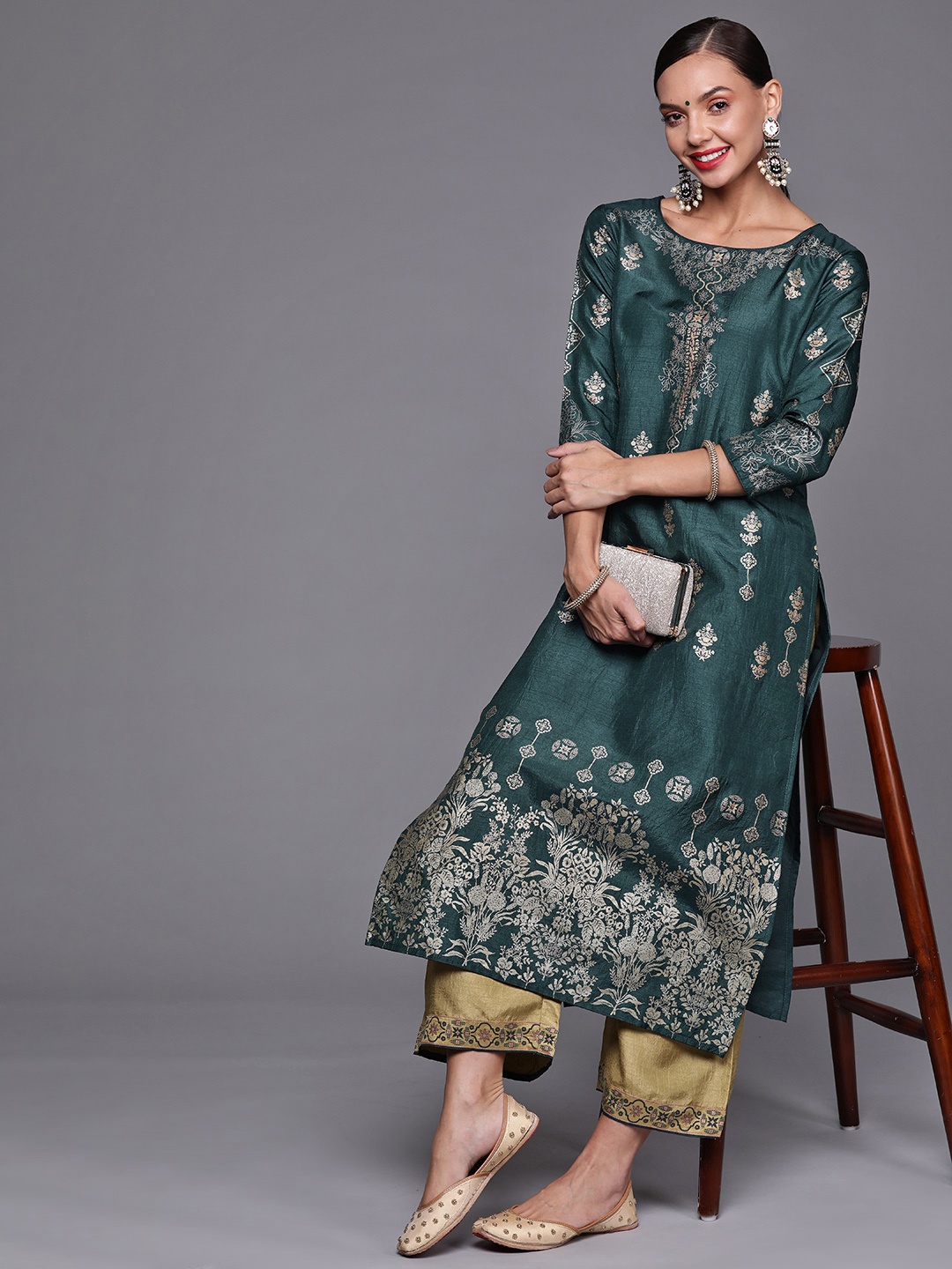

Indo Era Women Green Ethnic Motifs Printed Kurta with Palazzos