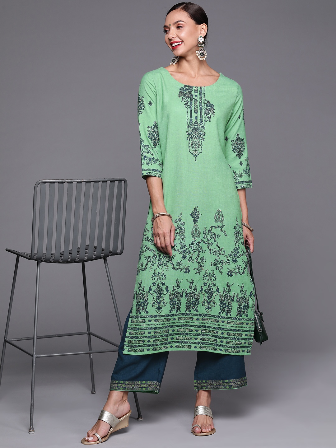 

Indo Era Women Green Ethnic Motifs Printed Kurta with Palazzos