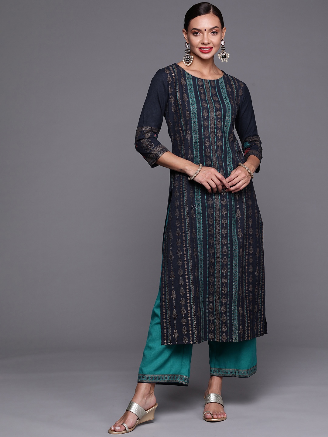 

Indo Era Women Navy Blue Ethnic Motifs Printed Kurta with Palazzos