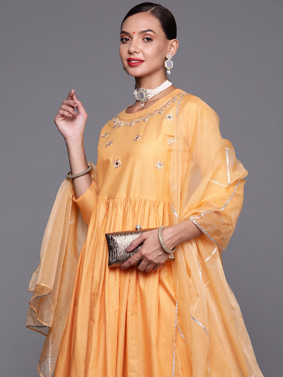 

Indo Era Women Orange Embroidered Empire Kurta with Trousers & With Dupatta