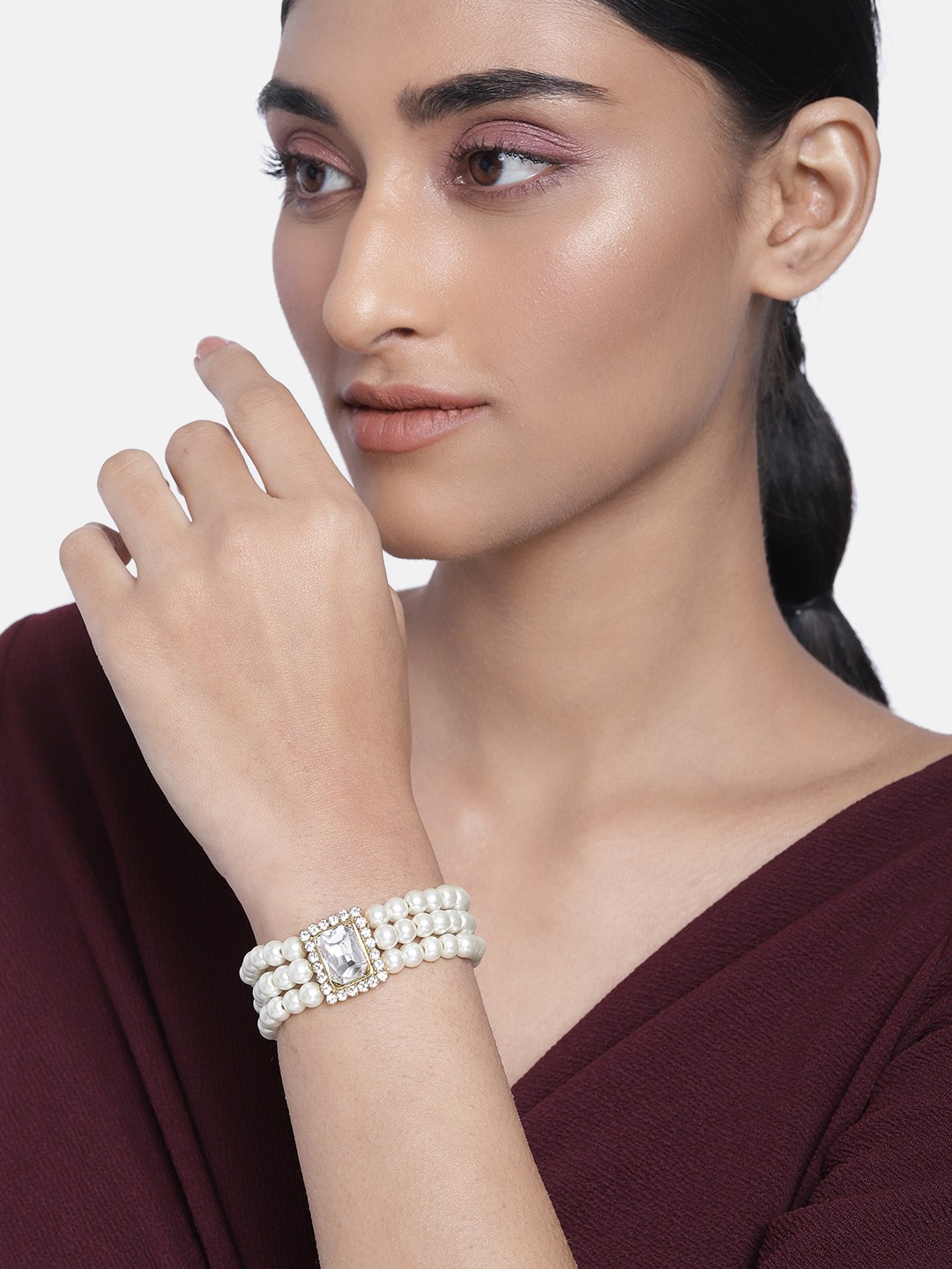 

Peora Women White Gold-Plated Pearl Studded Cube Crystal In Middle Bracelet