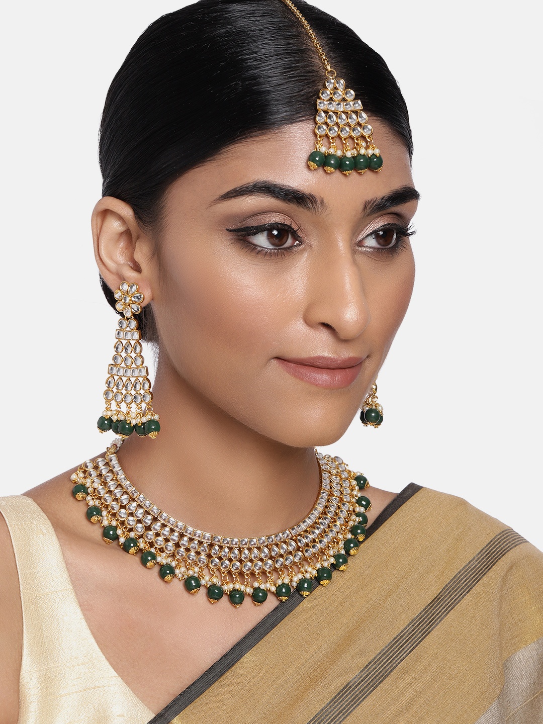 

Peora Traditional Kundan Green Pearl Choker Necklace Earring Maang Tikka Jewellery Set