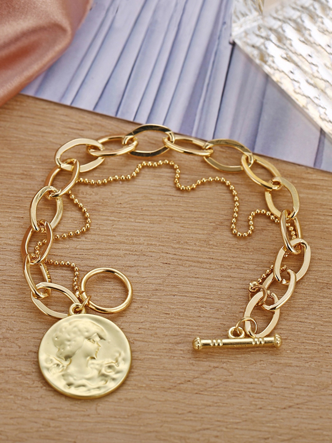 

Peora Women Gold-Plated Charm Bracelet