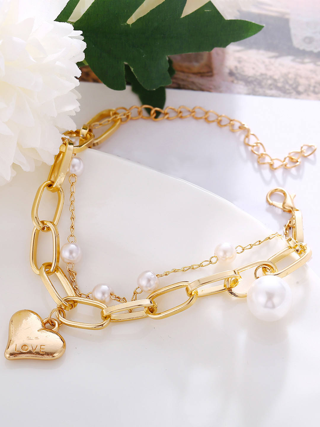 

Peora Women Gold-Toned & Off White Pearls Gold-Plated Charm Bracelet