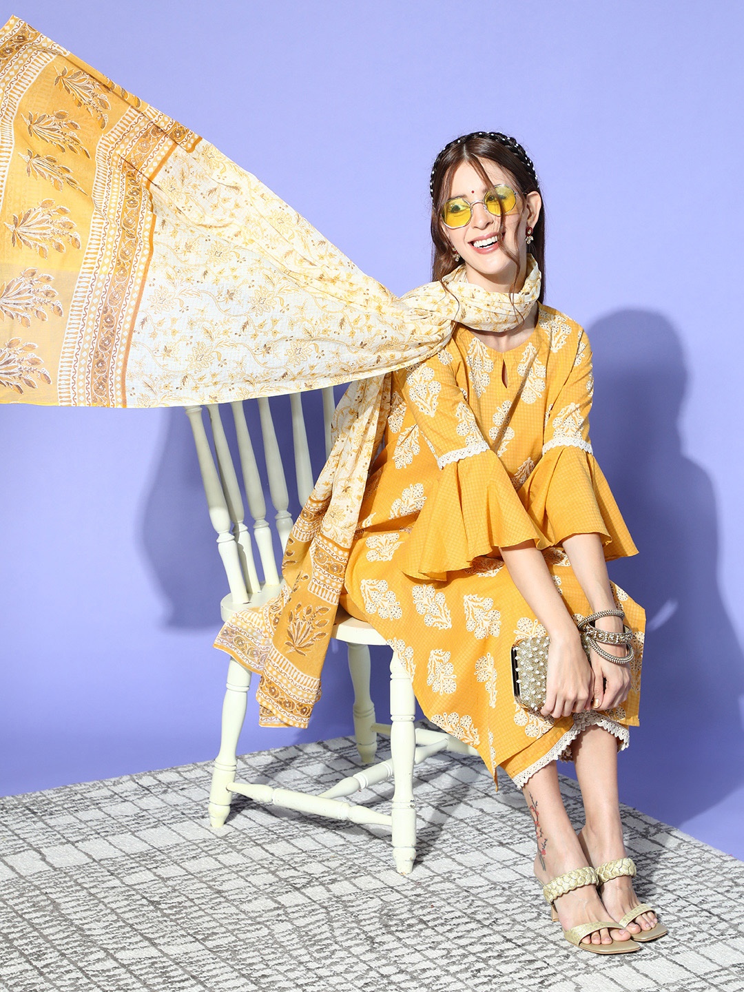 

Indo Era Ethnic Motifs Cotton Blend Feminine Frills Kurta Set, Yellow