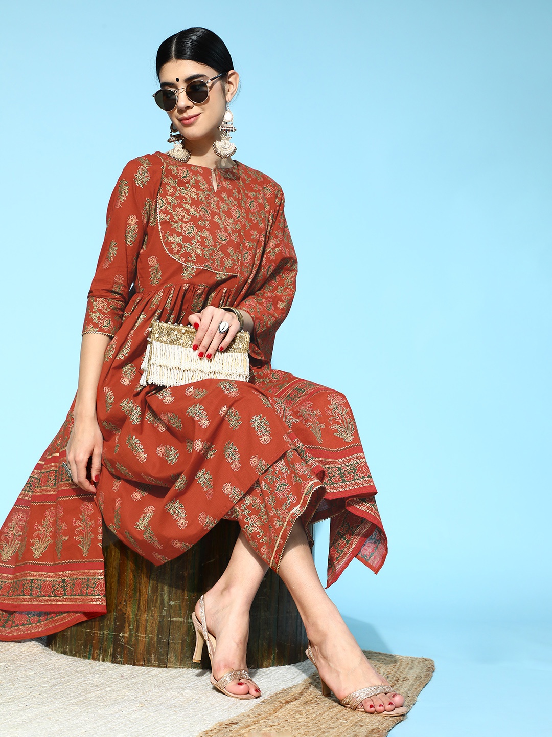 

Indo Era Ethnic Motifs Liva Print Parade Kurta Set, Rust