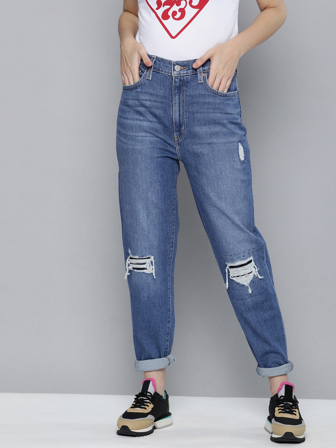 

Levis Women Blue Tapered Fit High-Rise Mildly Distressed Stretchable Jeans