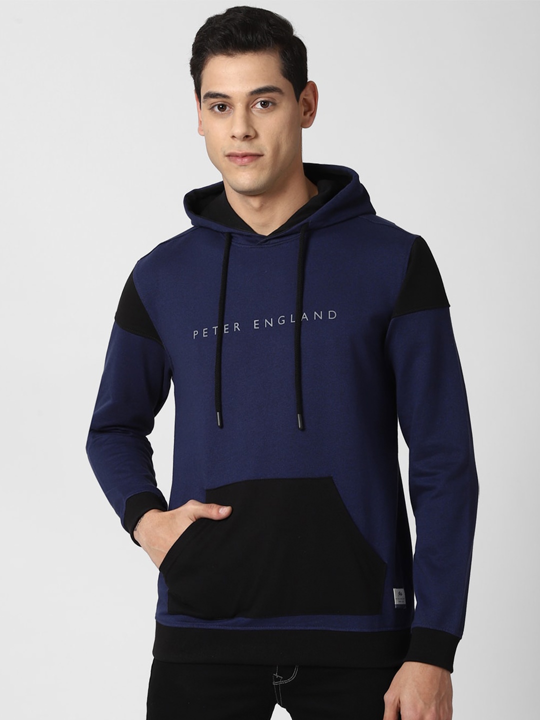 

Peter England Casuals Men Navy Blue & Black Colourblocked Hooded Sweatshirt