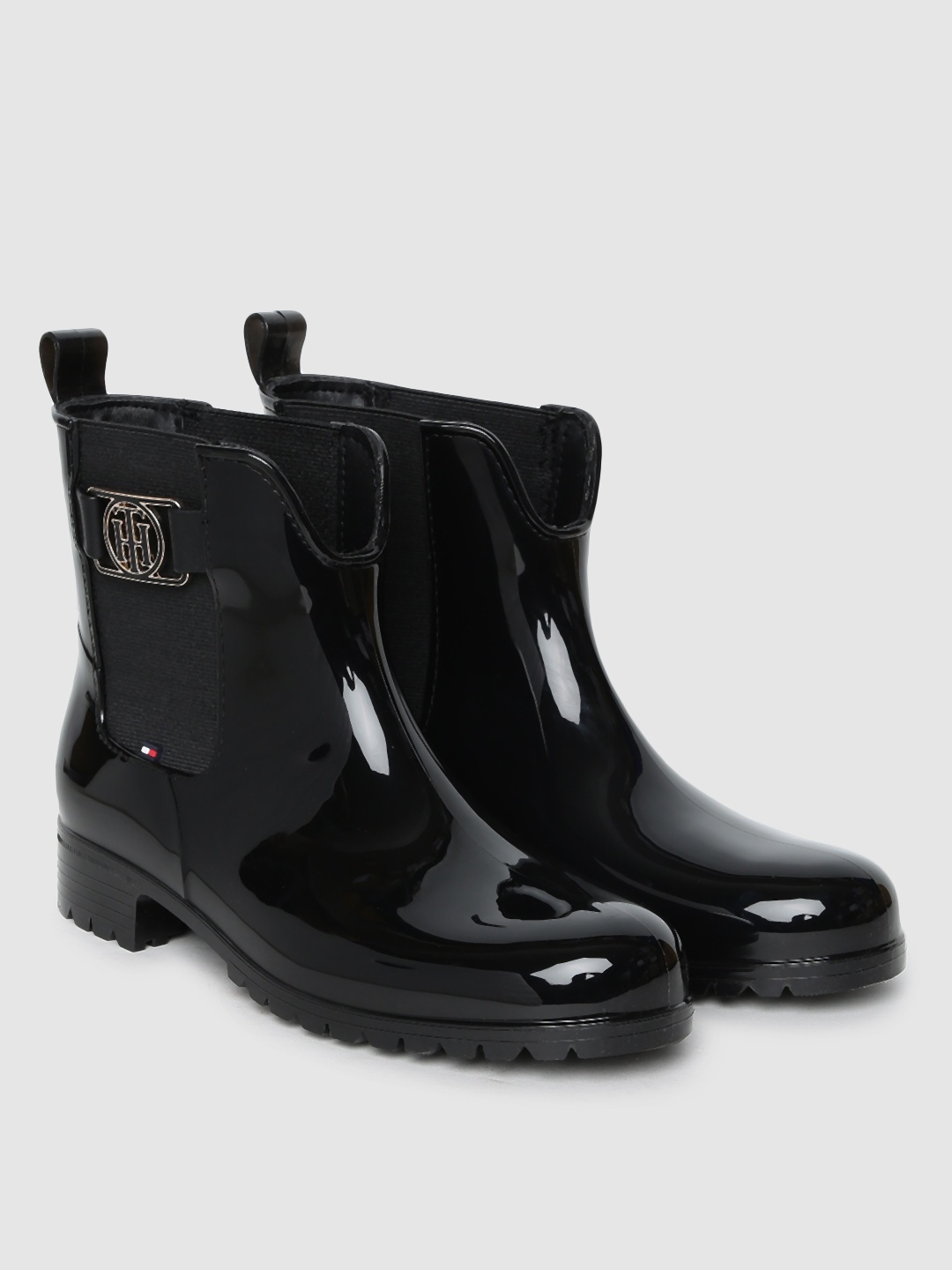 

Tommy Hilfiger Women Black Solid HARDWARE Mid-Top Chelsea Boots