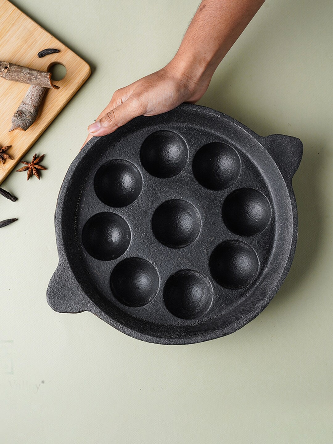 

The Indus Valley Black Solid Pre-Seasoned Cast Iron Paniyaram Pan