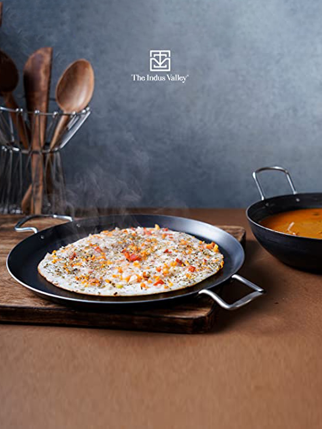 

The Indus Valley Black Double Handle Pre-Seasoned Iron Tawa