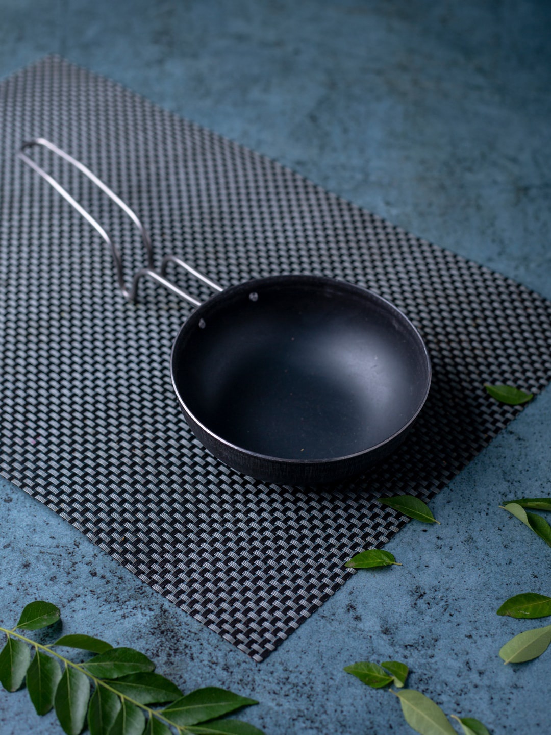 

The Indus Valley Black Pre-Seasoned Iron Tadka Pan With Steel Handle