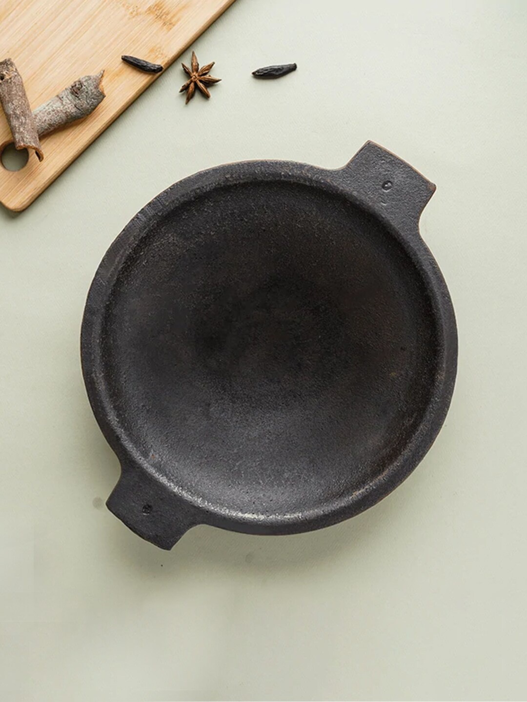 

The Indus Valley Black Pre-Seasoned Cast Iron Appam Pan - 28 cm
