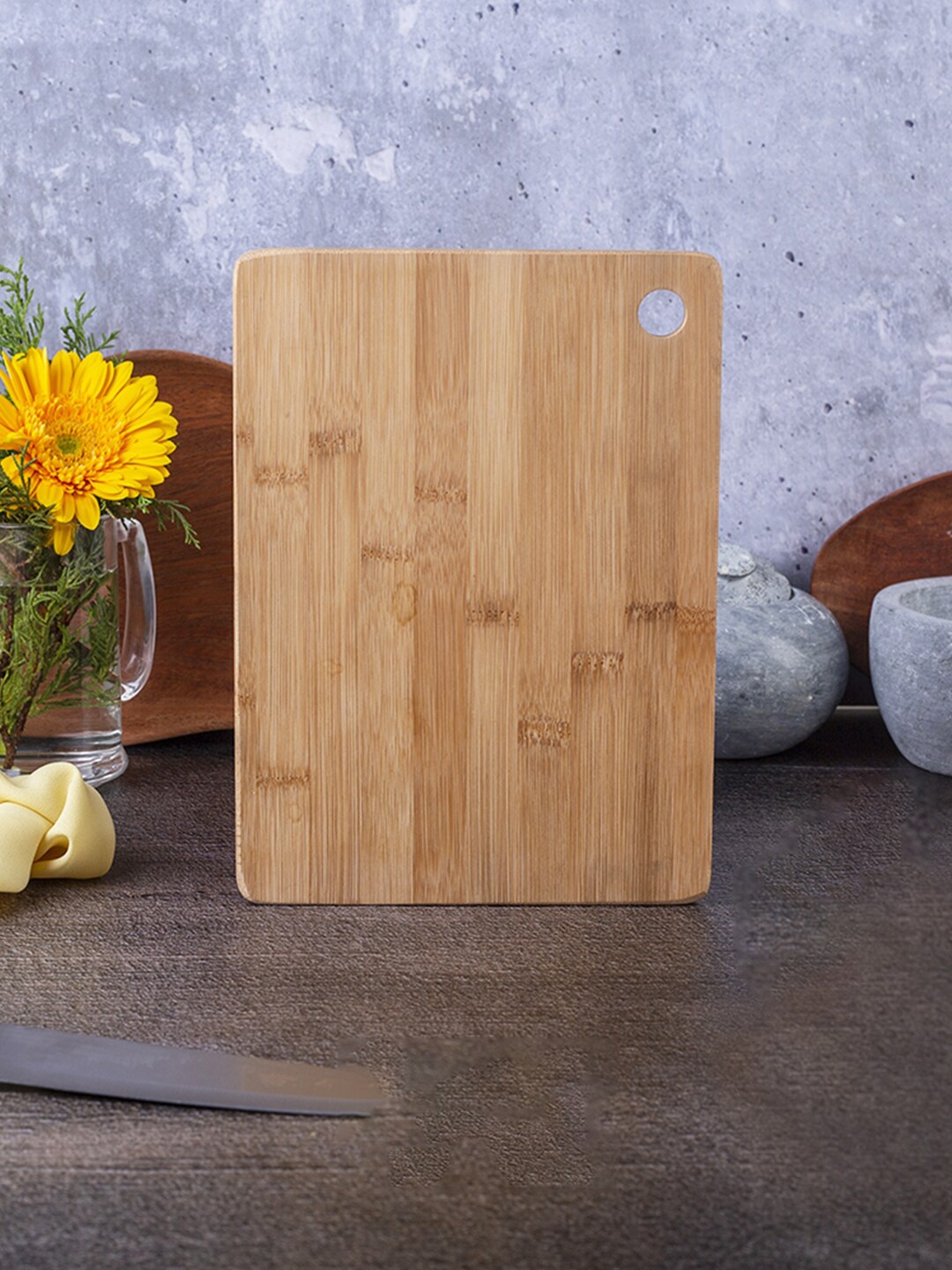 

The Indus Valley Brown Medium & Reversible Bamboo Wood Chopping Board with Handle