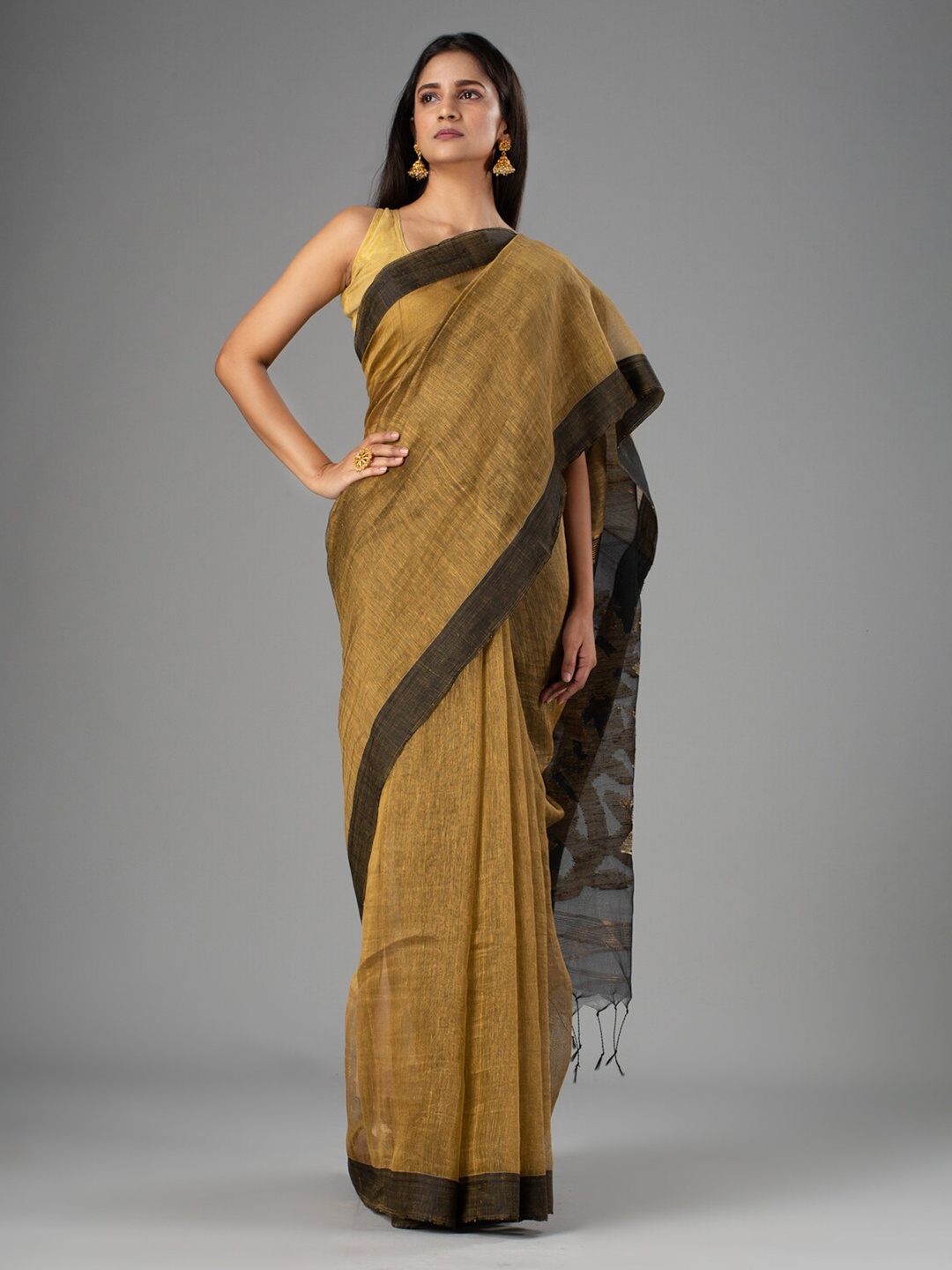 

Mitera Beige & Black Woven Design Saree