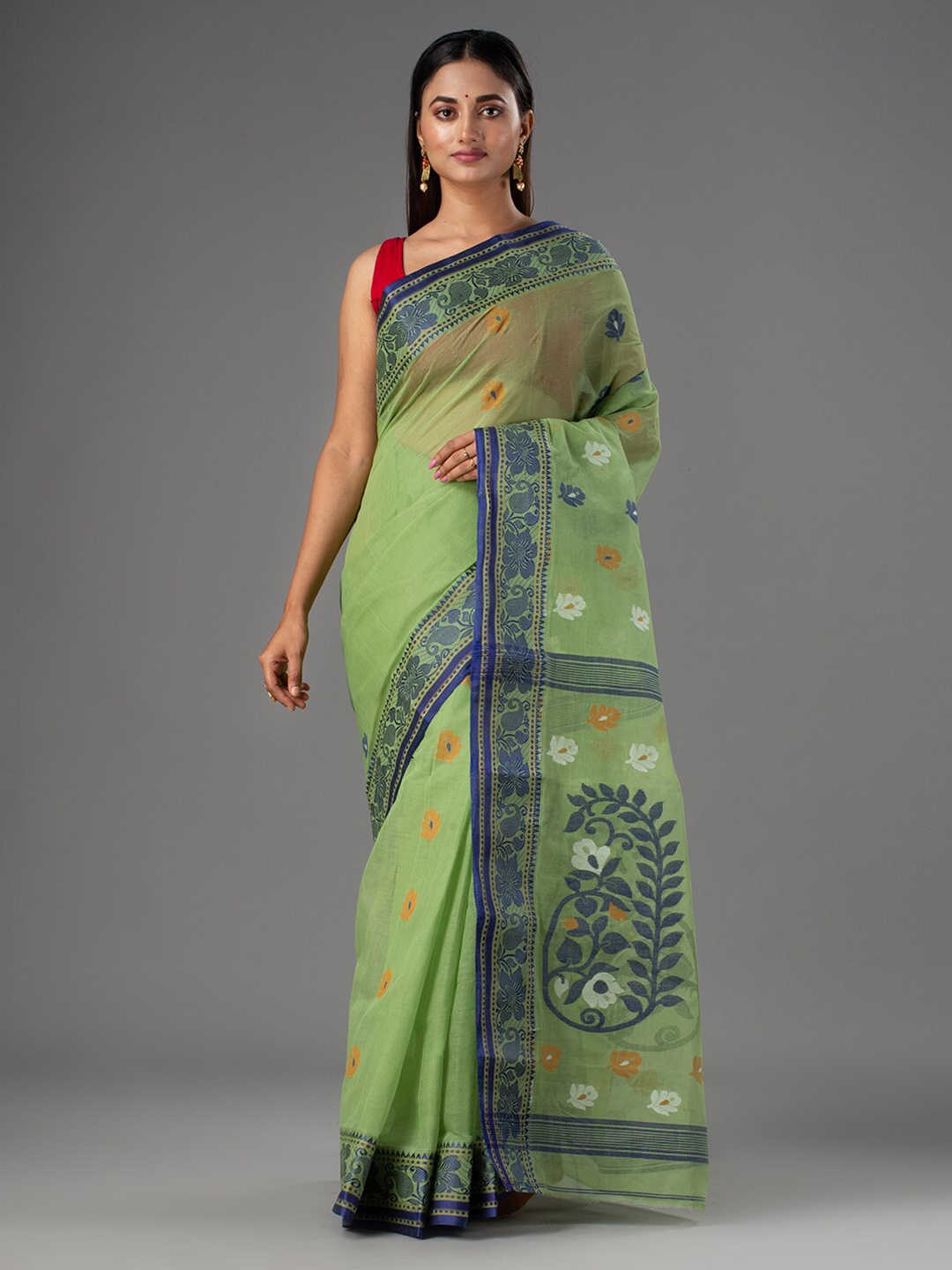 

Mitera Green & Blue Ethnic Motifs Pure Cotton Bengal Taant Saree